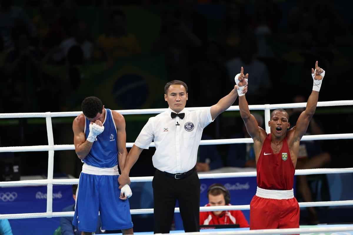 Imagens do combate em que Robson Conceio conquistou o ouro no Rio