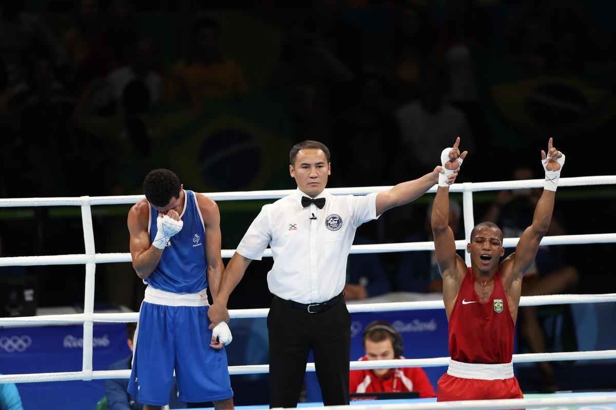 Imagens do combate em que Robson Conceio conquistou o ouro no Rio