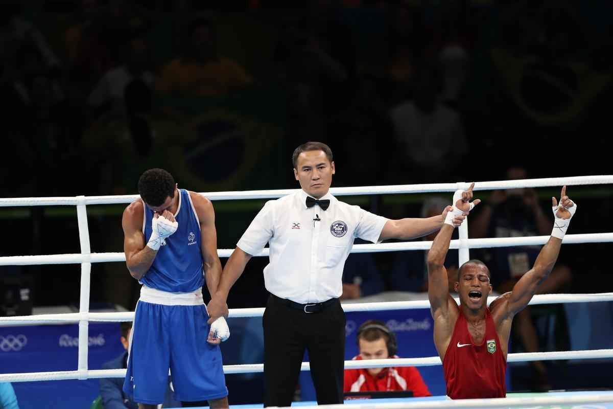 Imagens do combate em que Robson Conceio conquistou o ouro no Rio