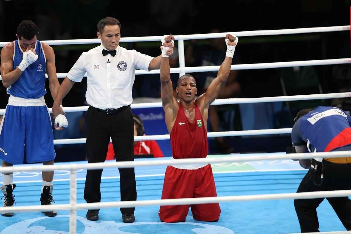 Imagens do combate em que Robson Conceio conquistou o ouro no Rio