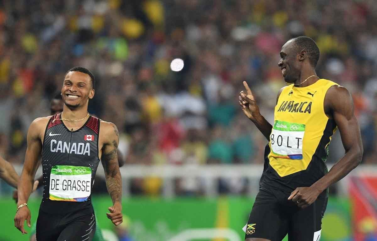 Imagens da disputa entre Bolt e De Grasse na semifinal dos 200m rasos