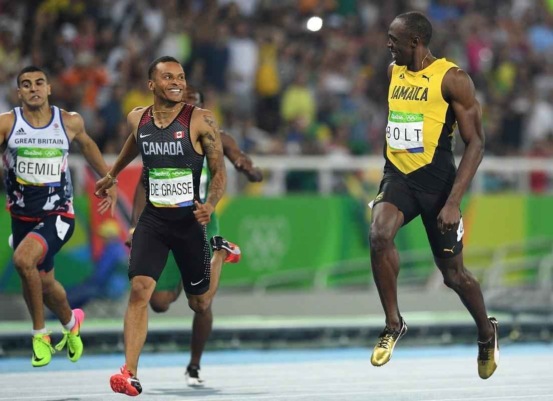 Imagens da disputa entre Bolt e De Grasse na semifinal dos 200m rasos