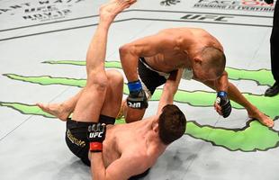 Na luta principal do UFC 204, em Manchester, Michael Bisping supera Dan Henderson em polmica deciso unnime dos juzes e tem sucesso na primeira defesa de cinturo do peso mdio