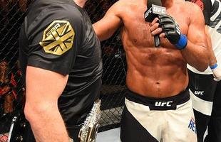 Na luta principal do UFC 204, em Manchester, Michael Bisping supera Dan Henderson em pol�mica decis�o un�nime dos ju�zes e tem sucesso na primeira defesa de cintur�o do peso m�dio