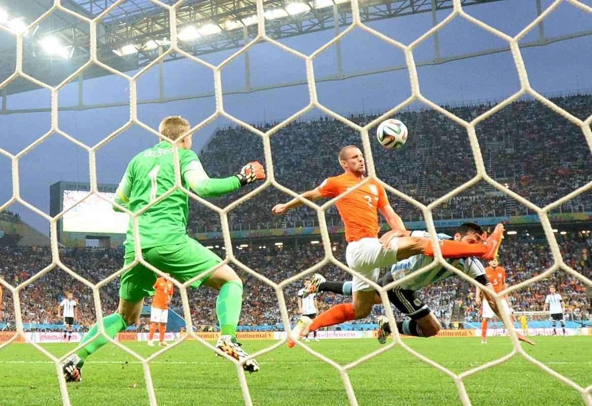 Imagens do jogo entre Holanda e Argentina, pela segunda semifinal da Copa do Mundo, no Itaquero, em So Paulo