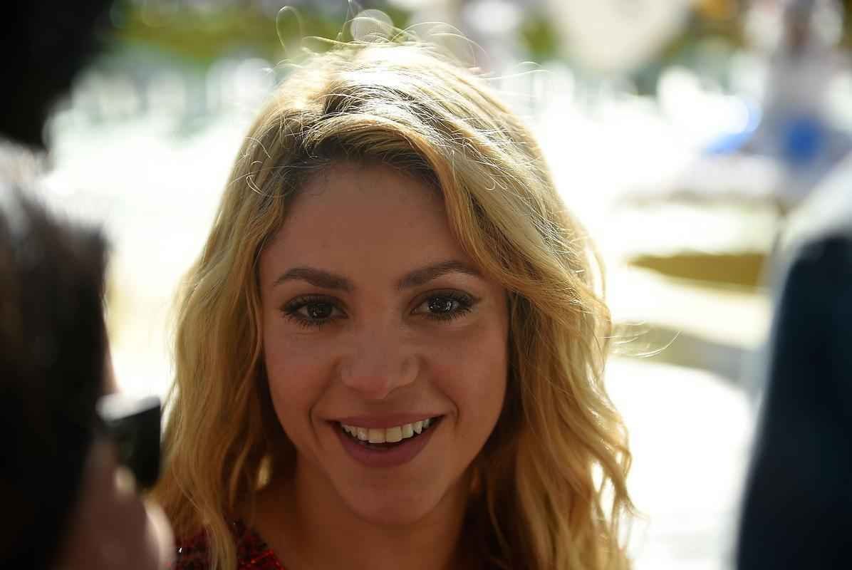Shakira na festa de encerramento da Copa; na sequncia, ela se encontrou com o marido Piqu, jogador do Barcelona, e com o filho Milan