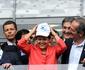 Atleticana Dilma Rousseff usa bon de torcida organizada do Cruzeiro no Mineiro
